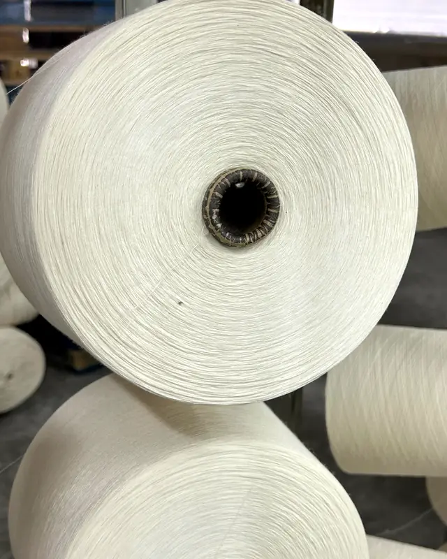 Yarn cones prepared for knitted fabric production in Portugal